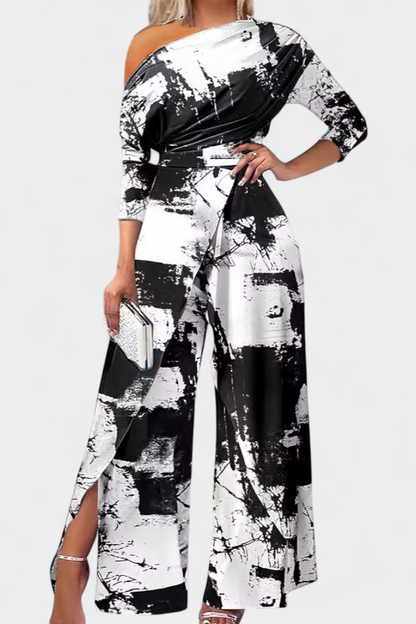 Brina™ - Asymmetrical Jumpsuit with Pearl-Embellished Shoulders and Straight Legs